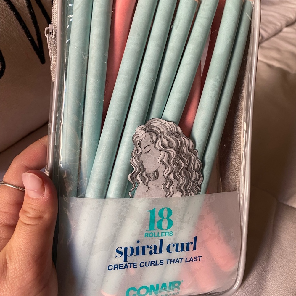 Consist spiral curl rollers
